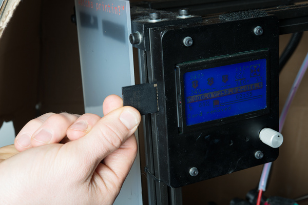 Insert the SD card in your 3D printer