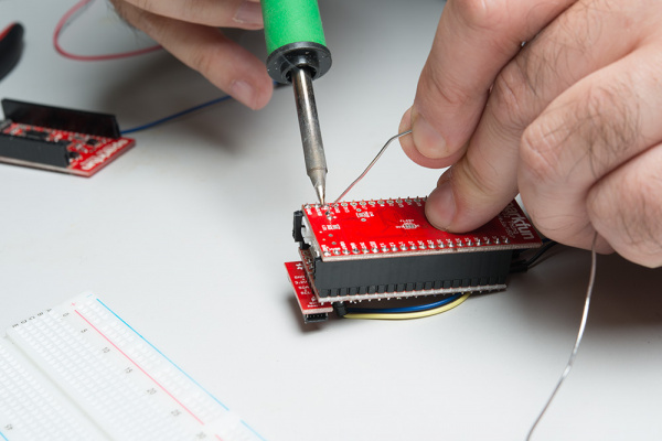 Soldering the female headers to the ESP32