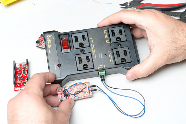 Wires screwed into the terminal block and the terminal block back in the box