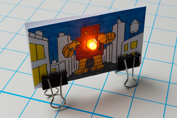 Using a second binder clip to create a standing artwork