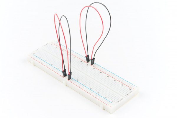 Connect power rows on a full-size breadboard