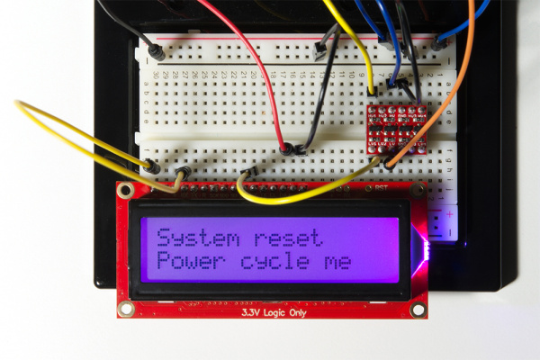 After Emergency Reset is performed, LCD display reads System reset Power cycle me