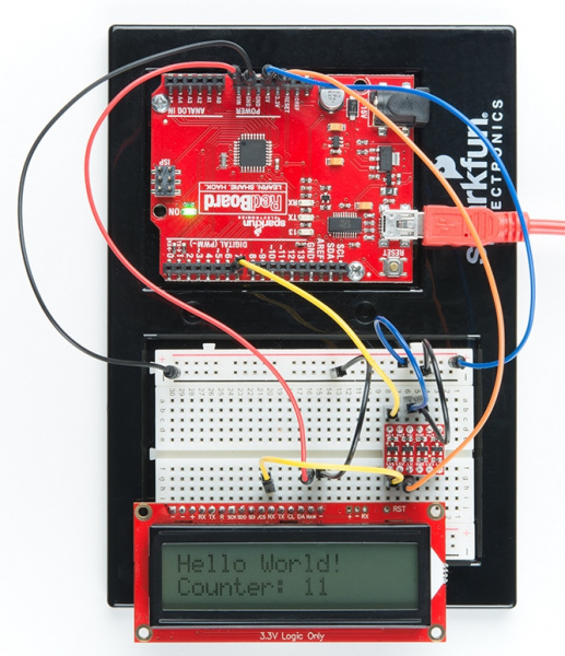 Hello World! Counter: 11 is displayed on LCD screen once code is uploaded to the redboard