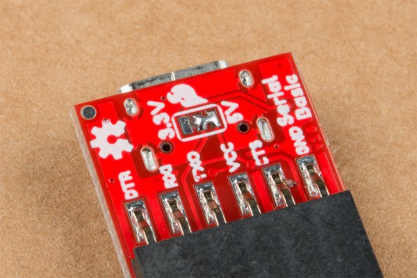 This image shows the same jumper but the small trace connecting 3.3V is cut and solder has been added to the 5V side of the three way jumper.