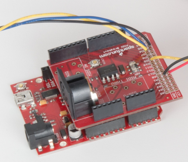 RedBoard with shield connected to servo and button