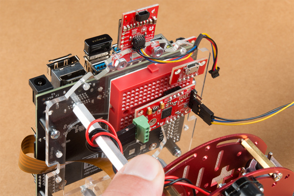 breadboard placement on chassis and qwiic cable to motor driver