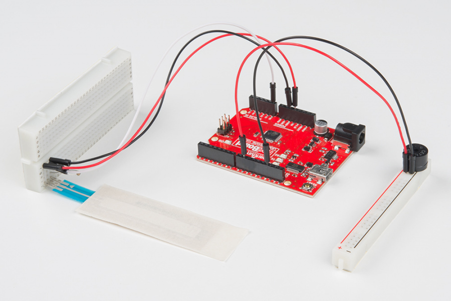 SoftPot Inserted Vertically on Breadboard Flush Against the Table